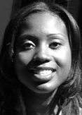 Shanta's face is in grayscale. She is smiling and has straight black hair.
