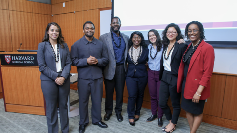 Seven Commonwealth Fund Fellows pose in the Pechet Room. 