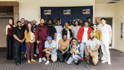 Aima Ahonkai stands with the MGH Medical Practice Evaluation Center team, Tennessee team, and Nashville Cutting Out Stigma barbers who are all involved in the program.