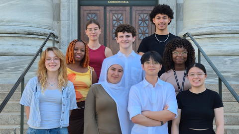 The 2026 Project Success cohort of 8 students stand outside Gordon Hall on the steps.