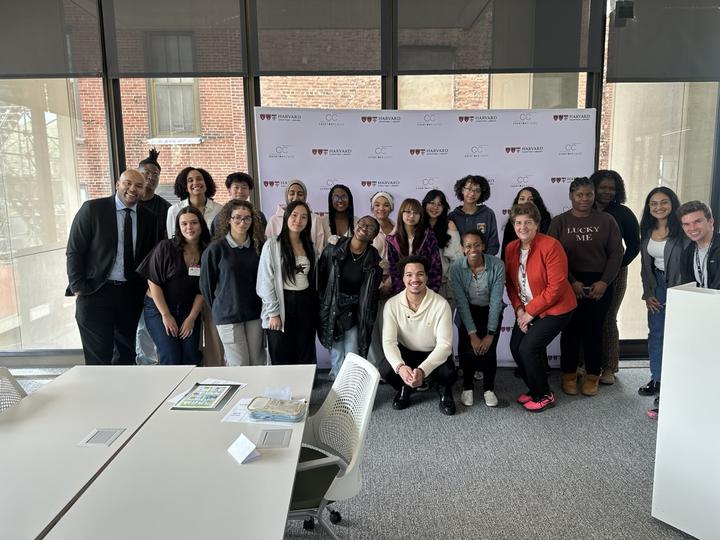 Randolph High School students and OCCE staff pose for a photo in a classroom in Countway Library.