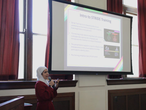 A Project Success student presents her final presentation in the Waterhouse Room.