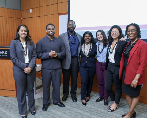 Seven Commonwealth Fund Fellows pose in the Pechet Room. 