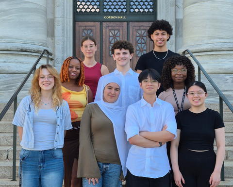 The 2026 Project Success cohort of 8 students stand outside Gordon Hall on the steps.